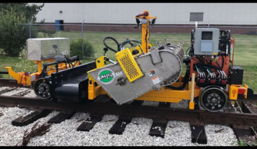 Tow Behind OTM Reclaimer, Railway maintenance, rail maintenance, railroad maintenance machines, railway equipment, maintenance of way equipment, hopper machine, track scrap machine, reclaimer machine, railroad scrap machine, rail cleanup equipment, tie plate and spike collector, otm removal machine, on-track material reclaimer, railroad scrap recovery machine, spike transfer machine, hopper machine, 