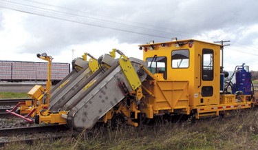 Railway maintenance, rail maintenance, railroad maintenance machines, railway equipment, maintenance of way equipment, hopper machine, track scrap machine, reclaimer machine, railroad scrap machine, rail cleanup equipment, tie plate and spike collector, otm removal machine, on-track material reclaimer, railroad scrap recovery machine
