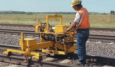 Railway maintenance, rail maintenance, railroad maintenance machines, railway equipment, maintenance of way equipment, mow equipment, mow supplier, clip applicator machine, clip retractor machine, concrete rail clip applicator, clip applicator, concrete railroad machines, steel rail clip applicator, steel rail clip retractor , concrete railroad clip retractor, 